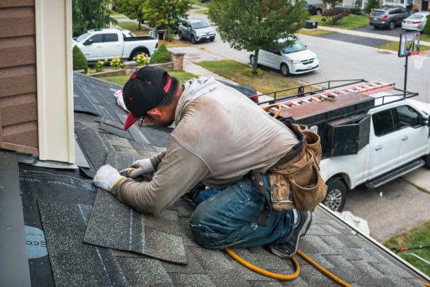 Professional Roof Replacement technician working in Gardiner, ME